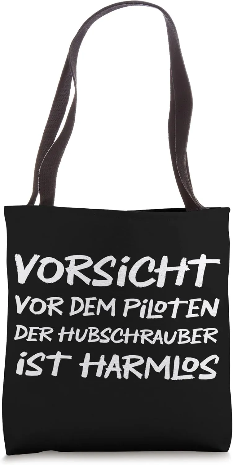 Beware of the pilot the helicopter is harmless German Quote Tote Bag