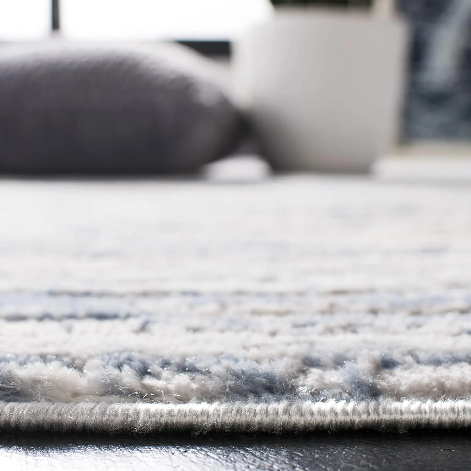 SAFAVIEH Amelia Collection Accent Rug - 2'2" x 4', Ivory & Blue, Modern Abstract Design, Non-Shedding & Easy Care, Ideal for High Traffic Areas in Entryway, Living Room, Bedroom (ALA768A)