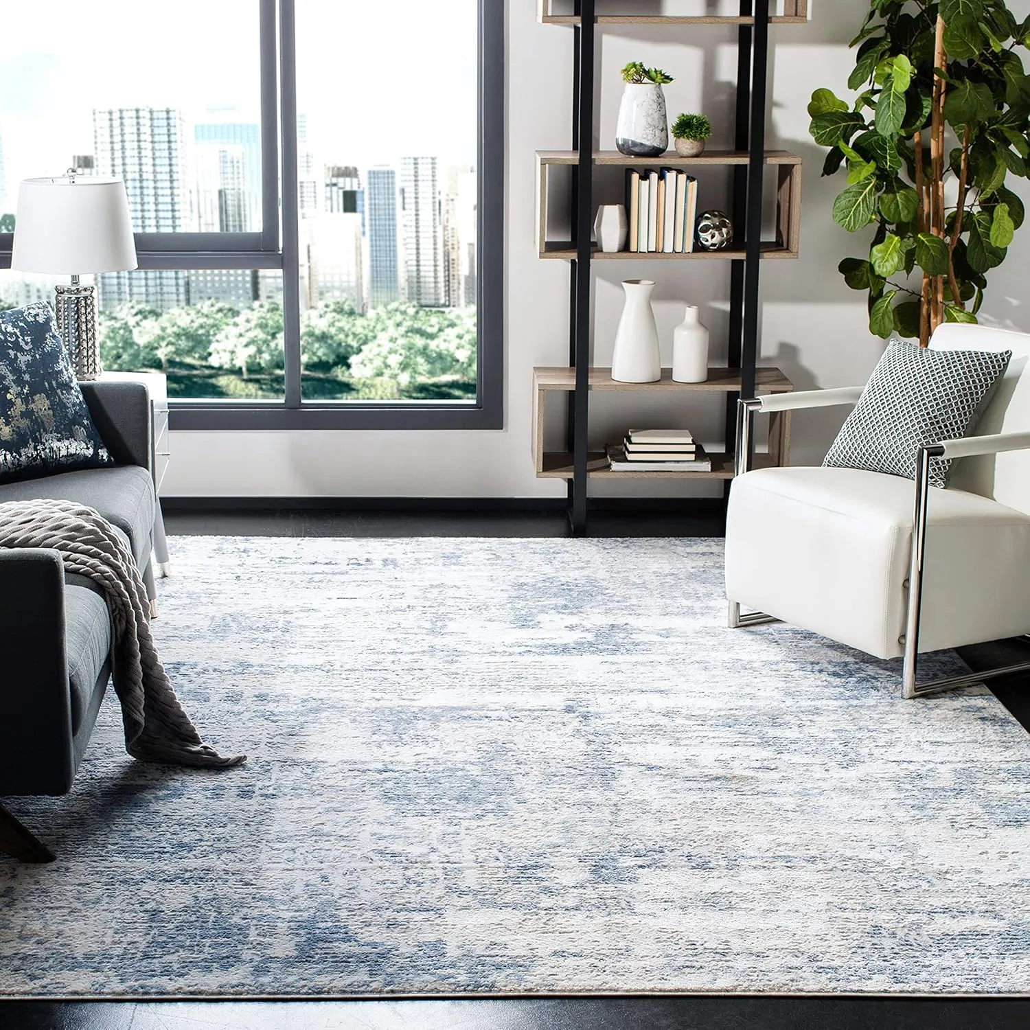 SAFAVIEH Amelia Collection Area Rug - 9' x 12', Ivory & Blue, Modern Abstract Design, Non-Shedding & Easy Care, Ideal for High Traffic Areas in Living Room, Bedroom (ALA700A)