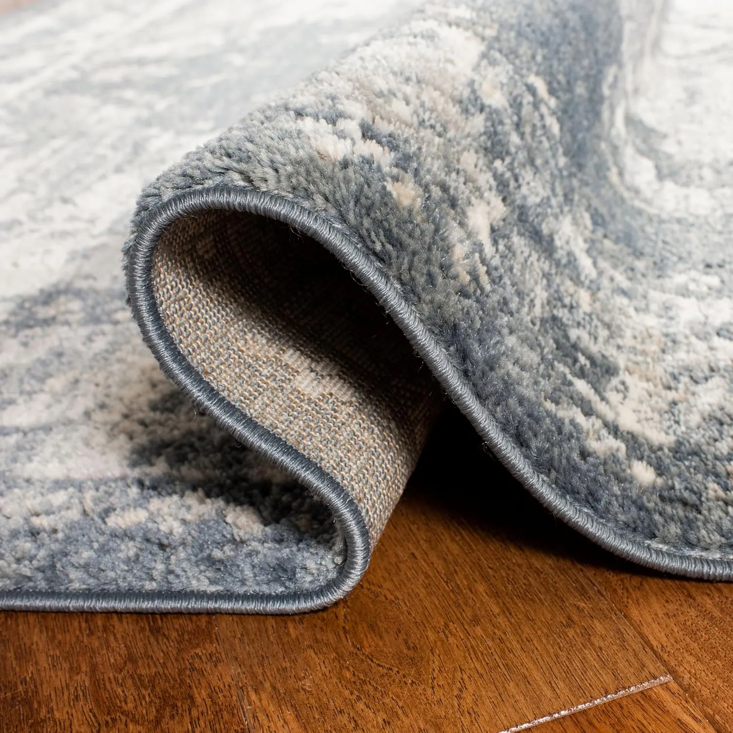 SAFAVIEH Oregon Collection Area Rug - 5'3" x 7', Blue & Creme, Oriental Distressed Design, Non-Shedding & Easy Care, Ideal for High Traffic Areas in Living Room, Bedroom (ORE898A)